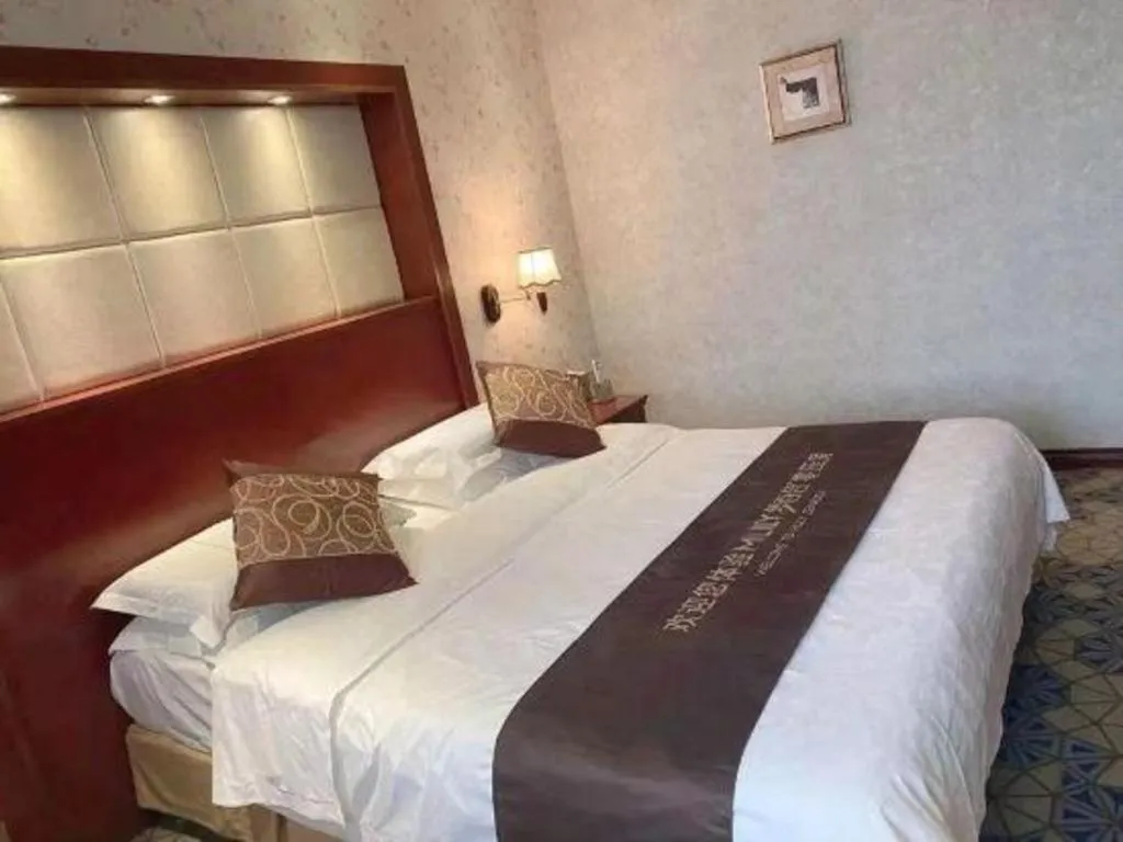 Bed in Changchun Global Hotel