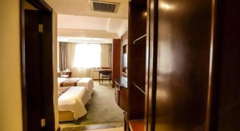 Bed in Changchun Global Hotel