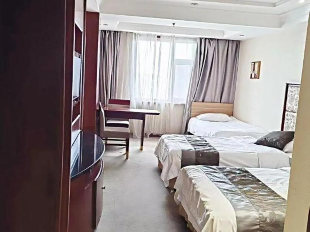 Bed in Changchun Global Hotel