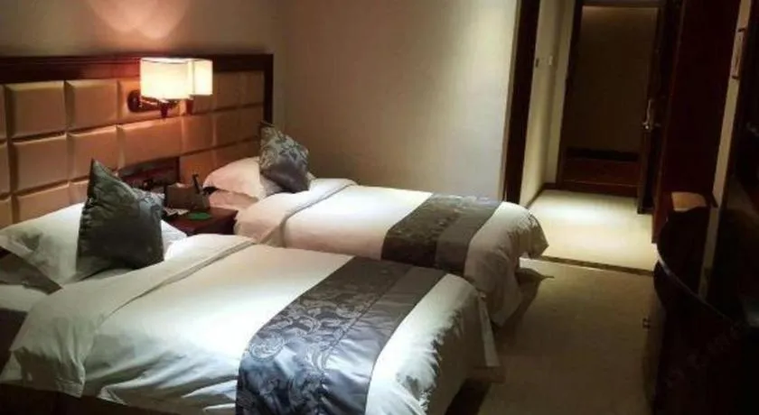 Bed in Changchun Global Hotel