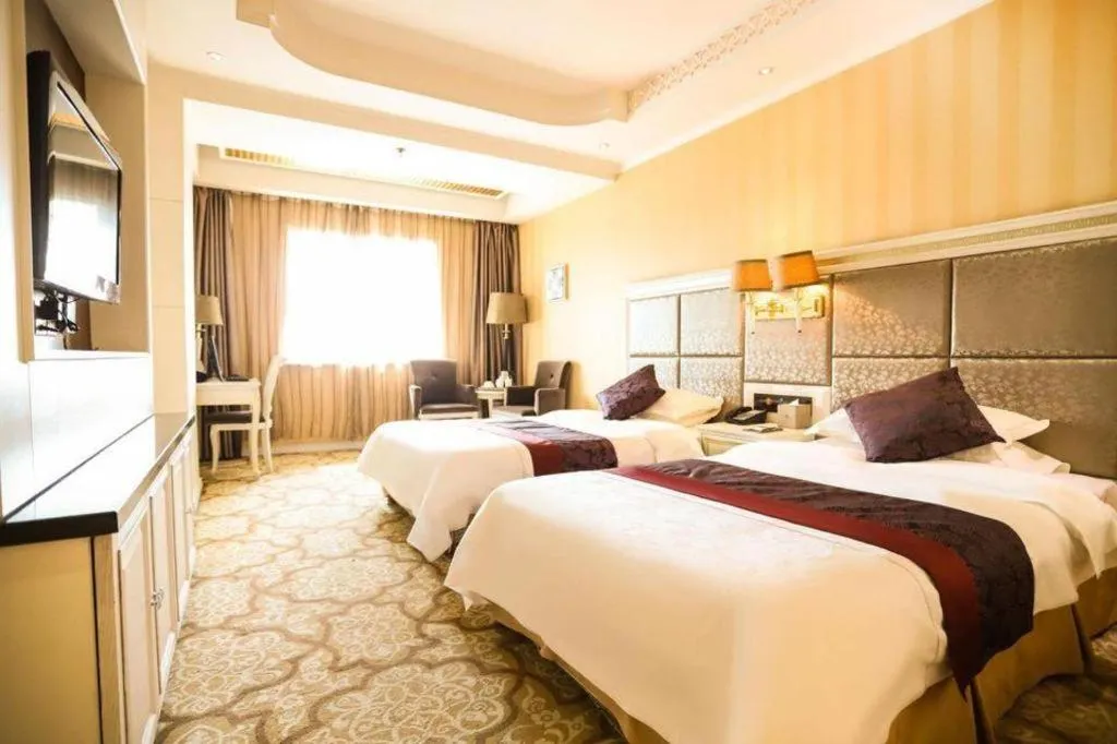 Bed in Changchun Global Hotel