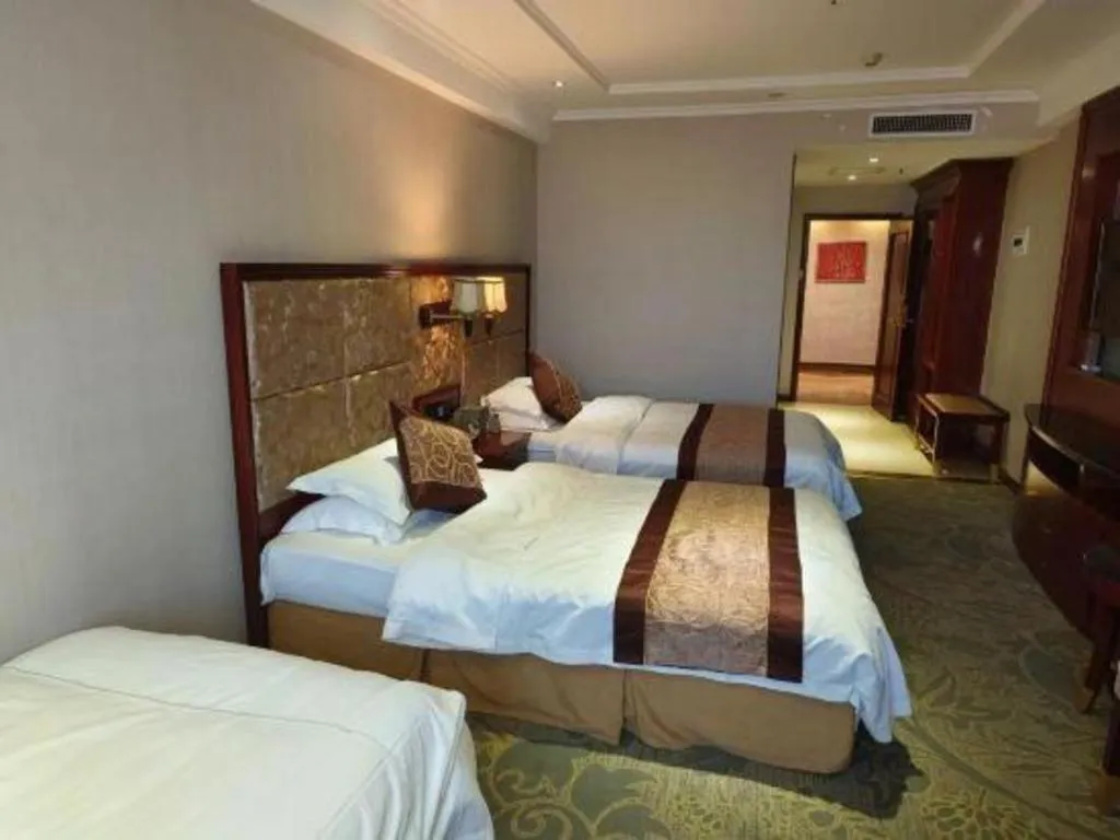 Bed in Changchun Global Hotel