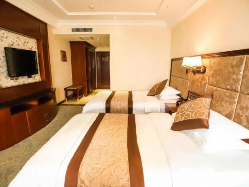 Bed in Changchun Global Hotel