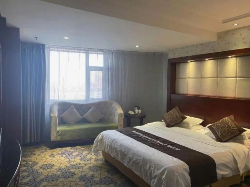 Bed in Changchun Global Hotel