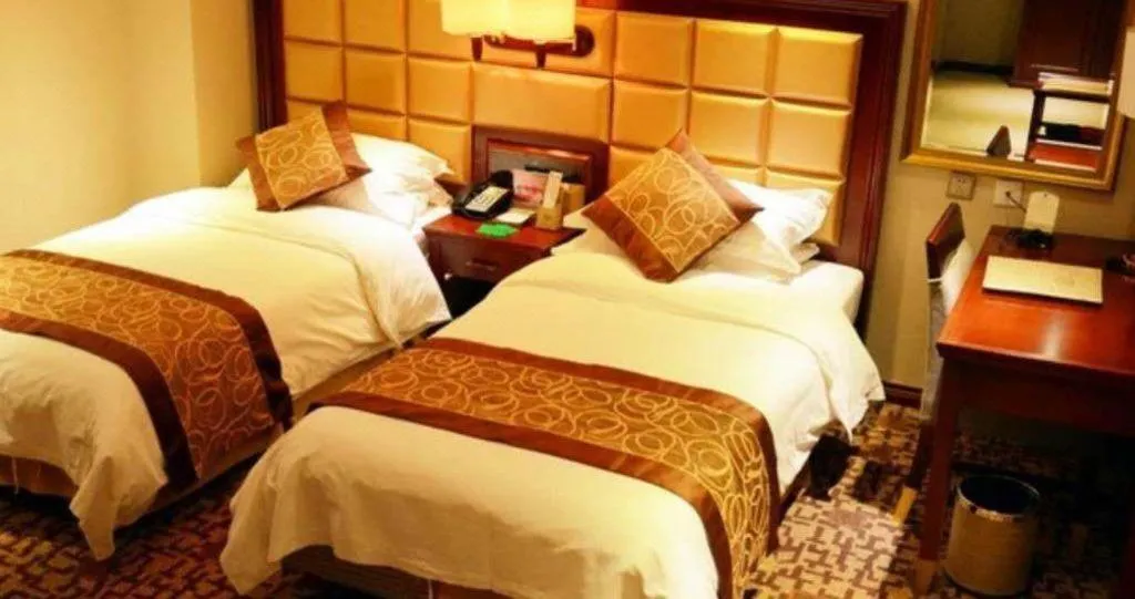 Bed in Changchun Global Hotel