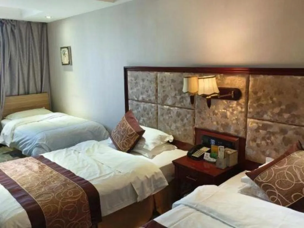 Bed in Changchun Global Hotel