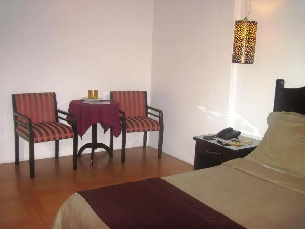 Bed in Alicia Hotel & Restaurant