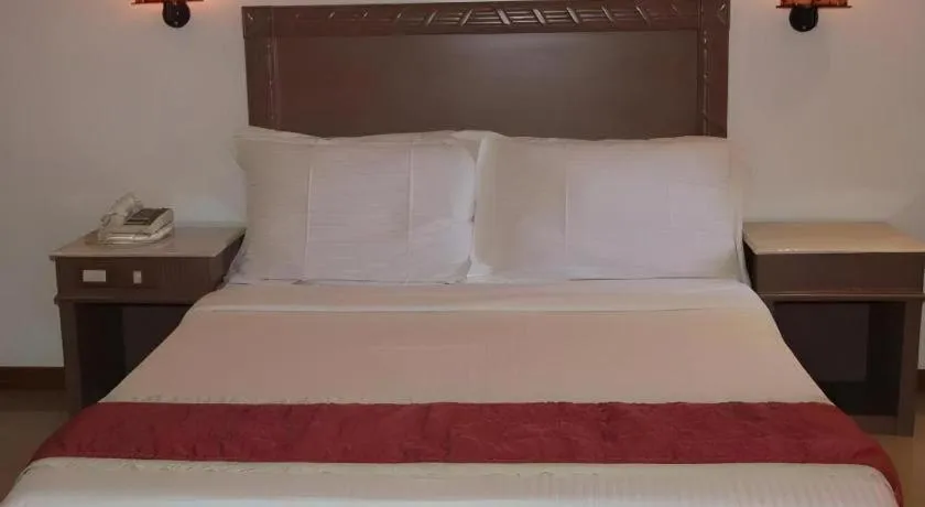 Bed in Alicia Hotel & Restaurant