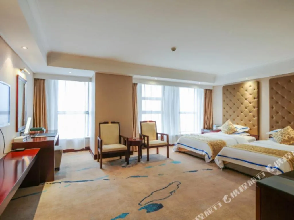 Bed in Jincheng Pacific Hotel