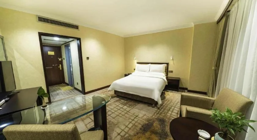 Bed in Jincheng Pacific Hotel