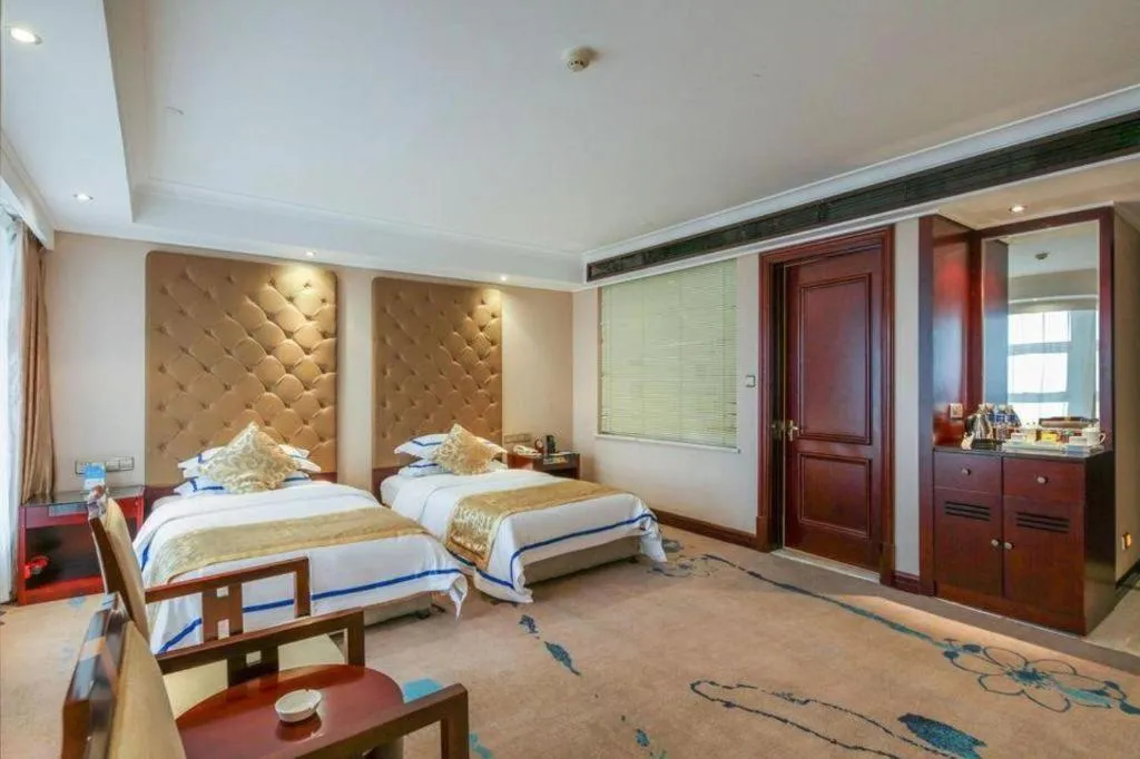 Bed in Jincheng Pacific Hotel