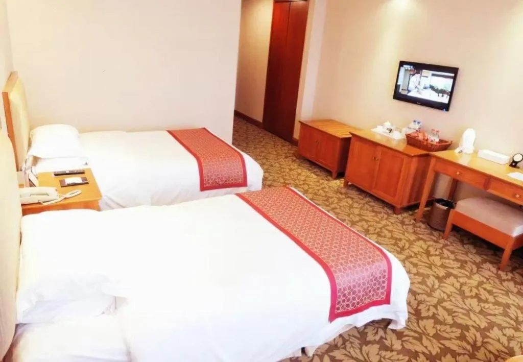 Bed in Jincheng Pacific Hotel
