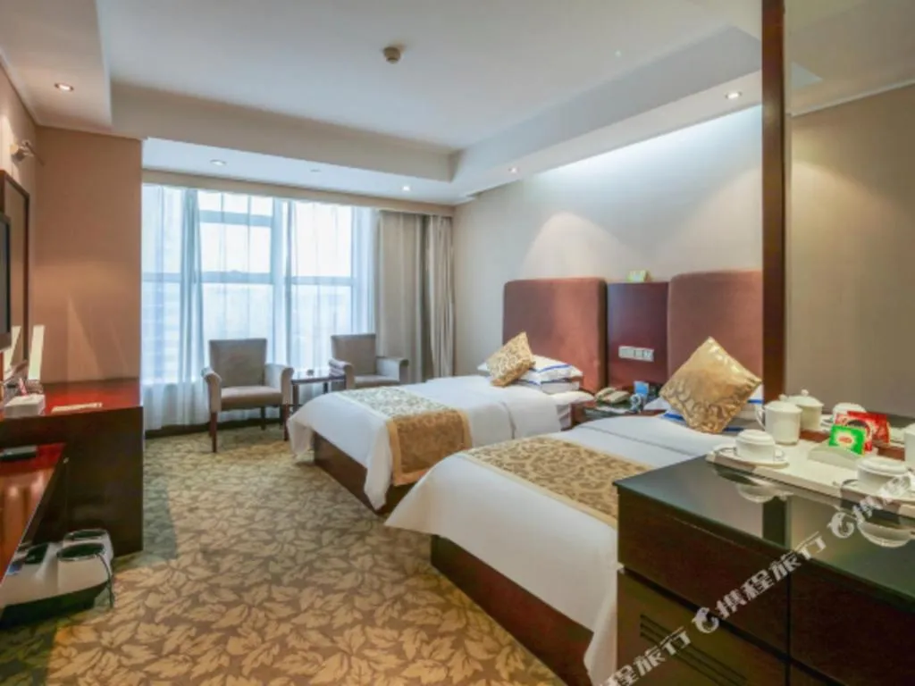 Bed in Jincheng Pacific Hotel
