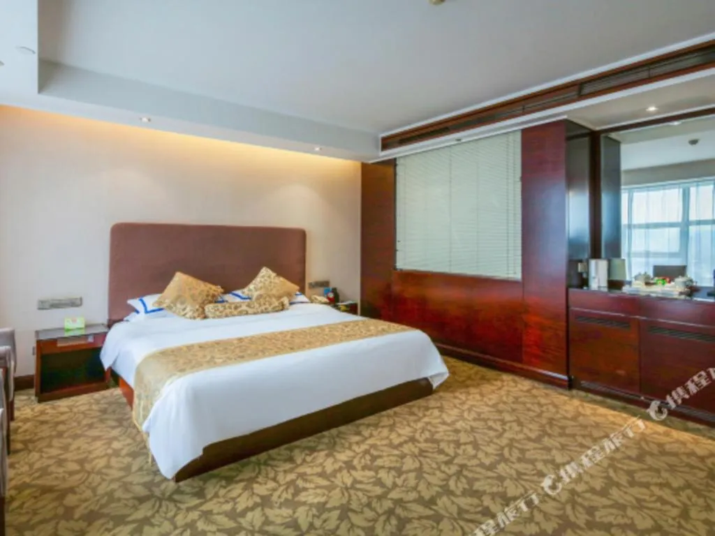 Bed in Jincheng Pacific Hotel