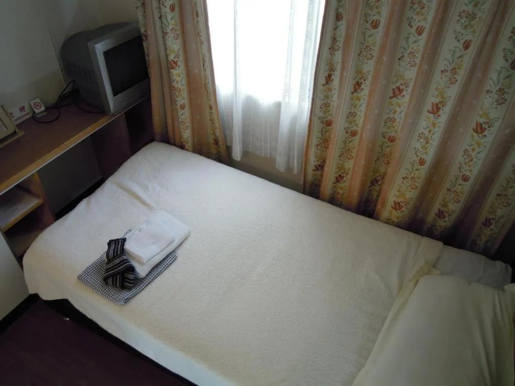 Bed in Eishinkan Hotel