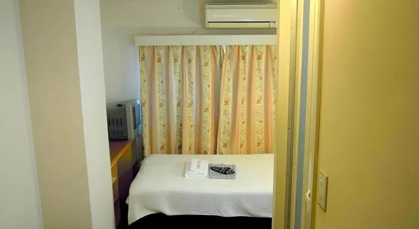 Bed in Eishinkan Hotel