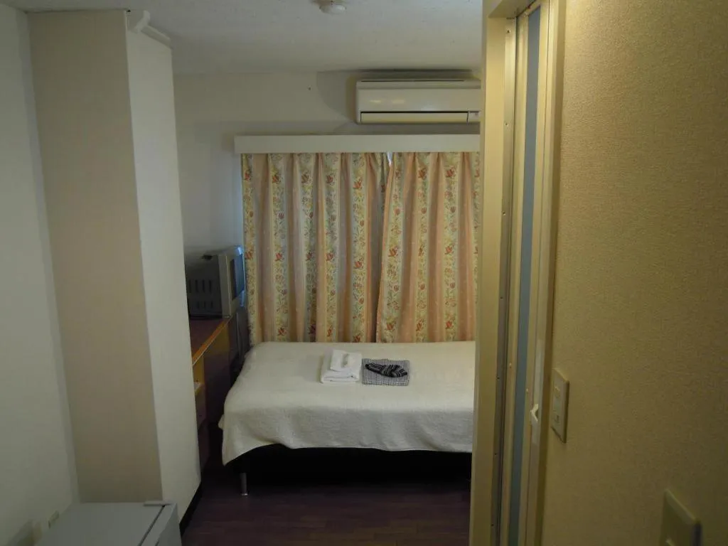 Bed in Eishinkan Hotel