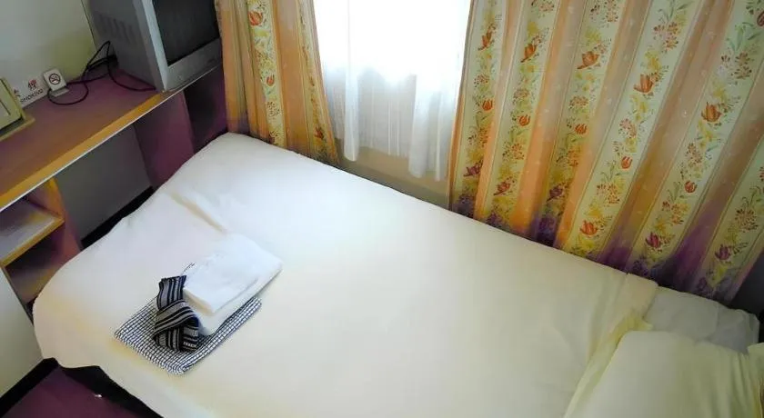 Bed in Eishinkan Hotel