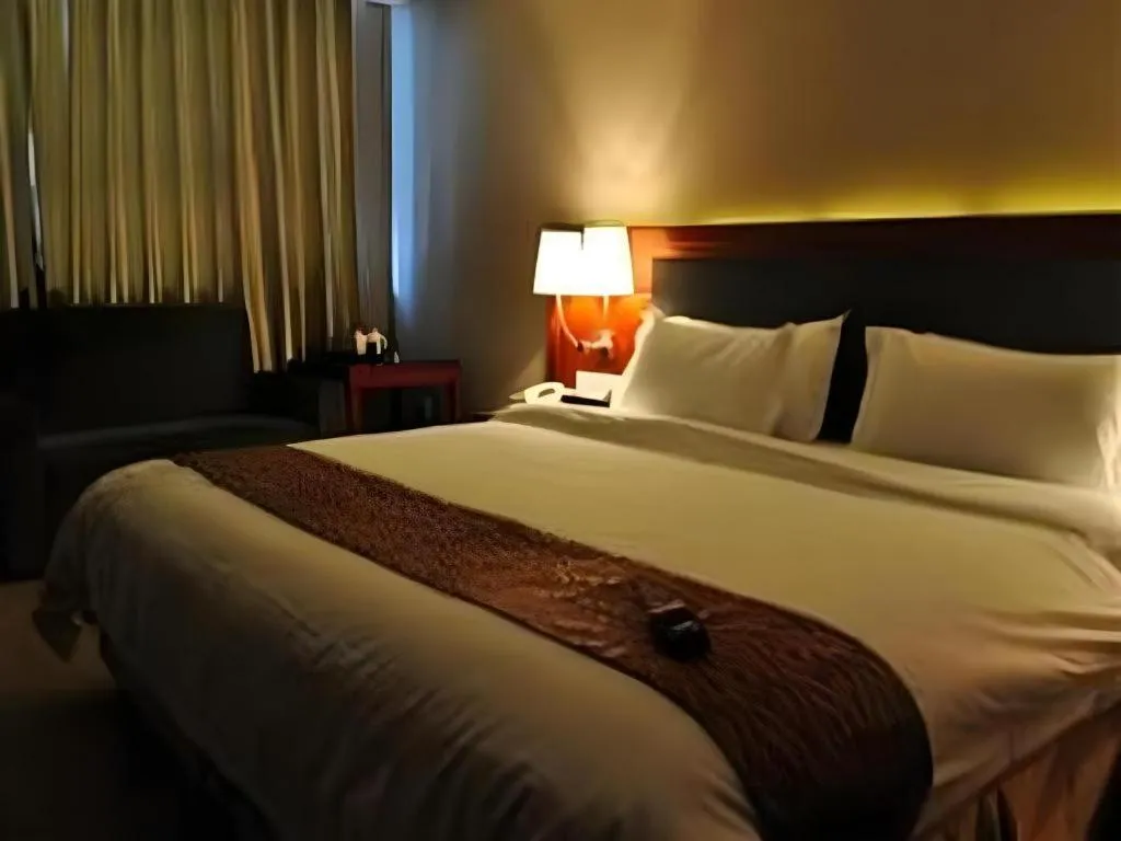 Bed in Guangna Hotel