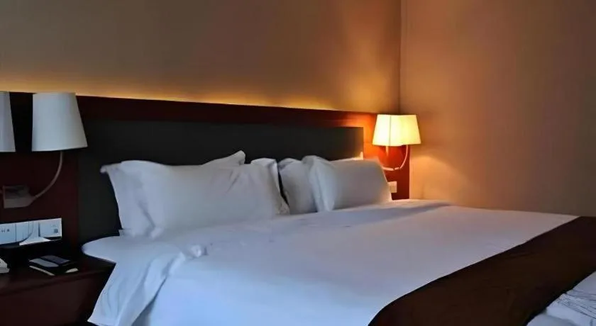 Bed in Guangna Hotel
