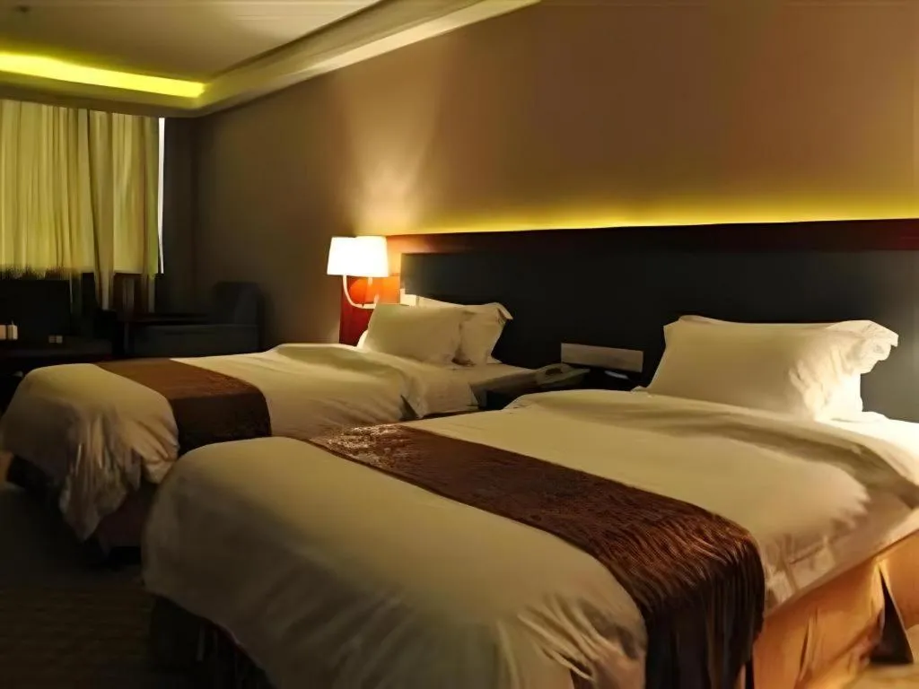 Bed in Guangna Hotel
