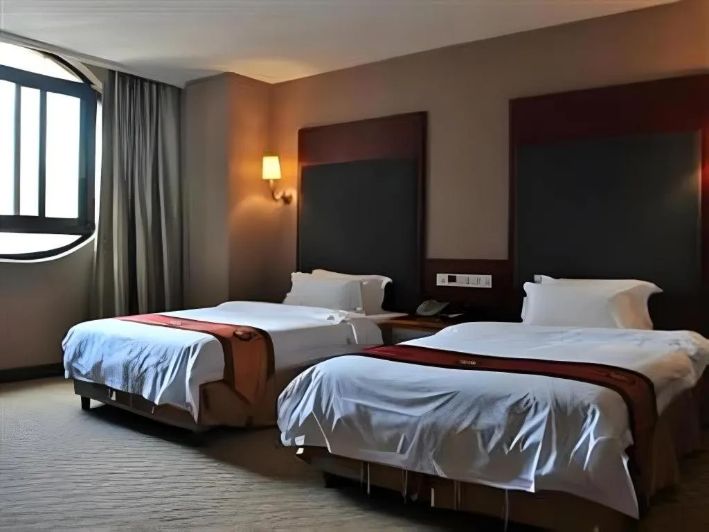 Bed in Guangna Hotel