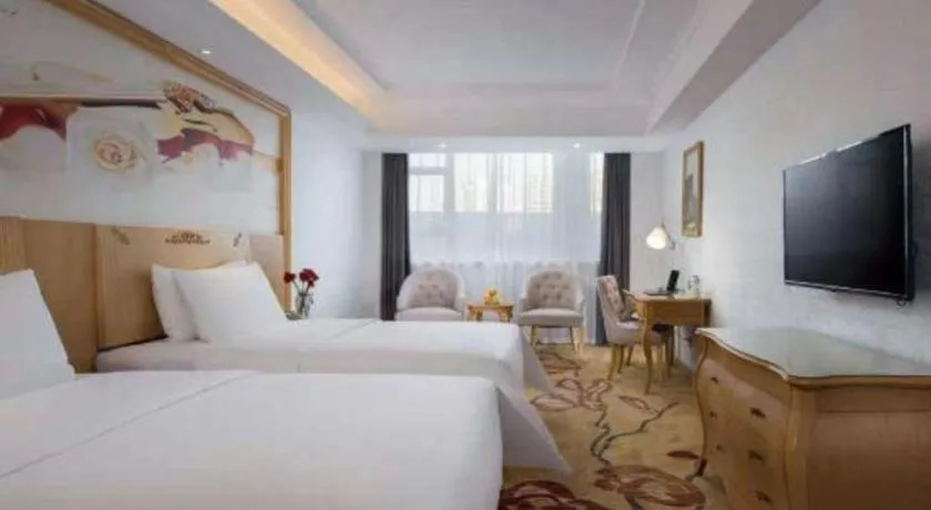 Bed in Guangna Hotel