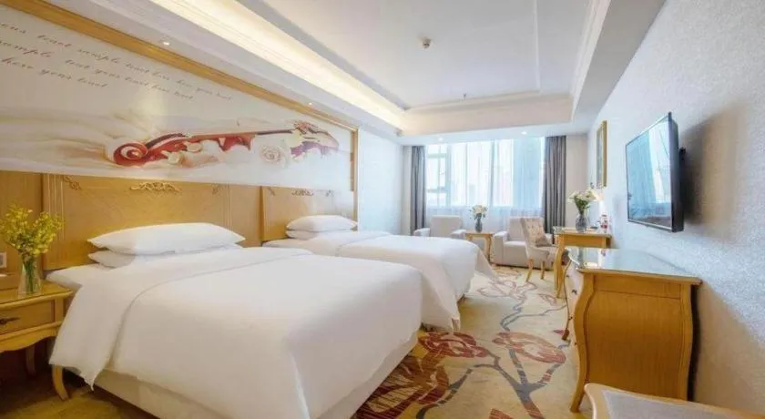 Bed in Guangna Hotel