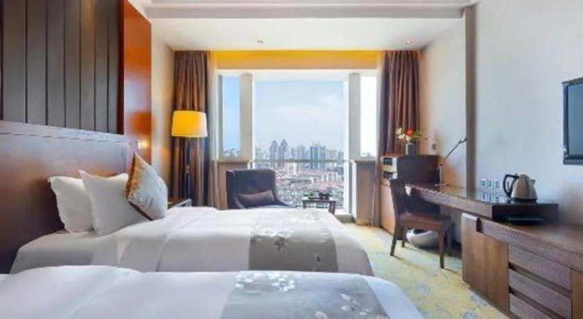 Bed in Qingdao Haidu Hotel