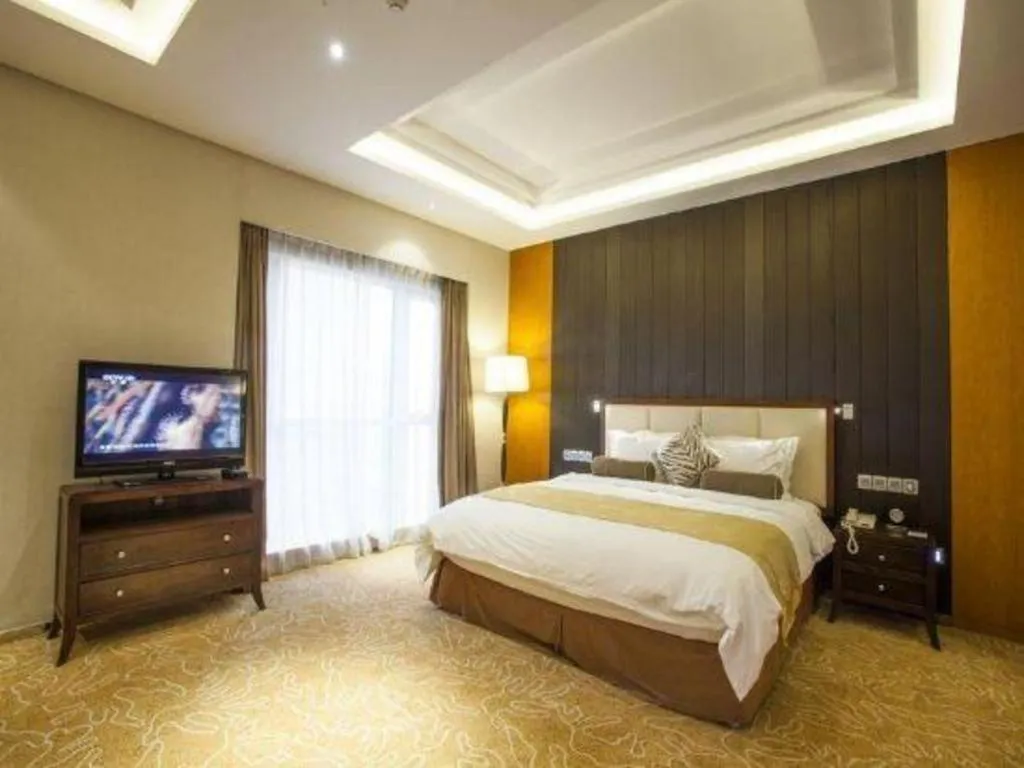 Bed in Qingdao Haidu Hotel