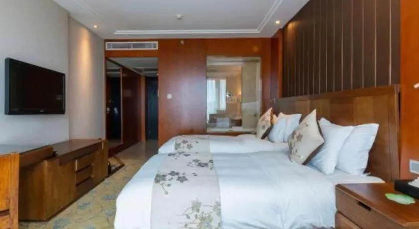 Bed in Qingdao Haidu Hotel