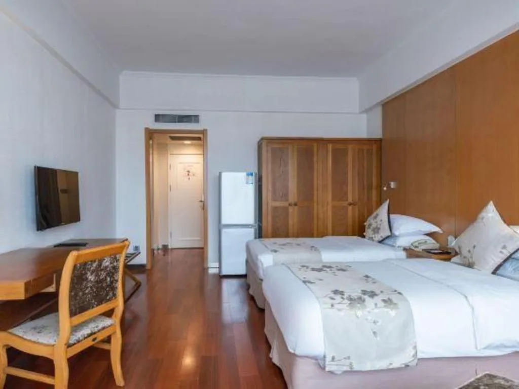 Bed in Qingdao Haidu Hotel