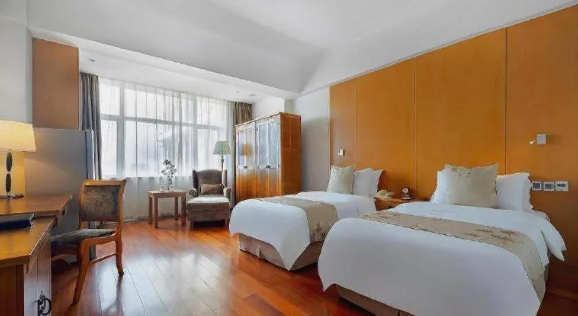 Bed in Qingdao Haidu Hotel