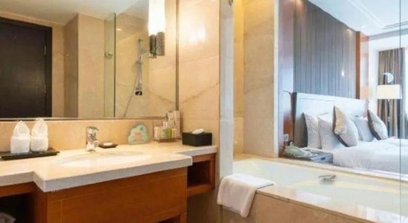 Bed in Qingdao Haidu Hotel