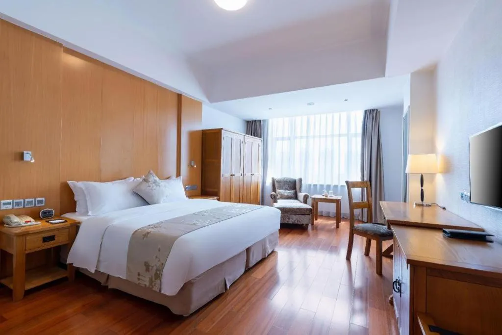 Bed in Qingdao Haidu Hotel