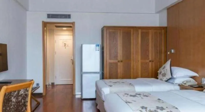 Bed in Qingdao Haidu Hotel