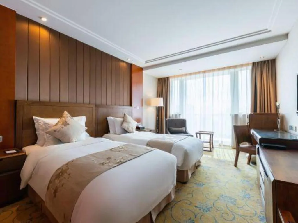 Bed in Qingdao Haidu Hotel