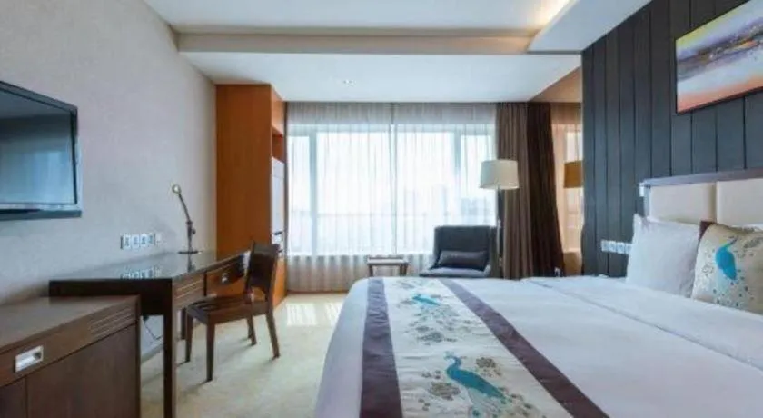 Bed in Qingdao Haidu Hotel