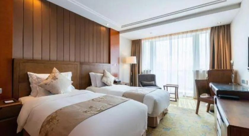 Bed in Qingdao Haidu Hotel