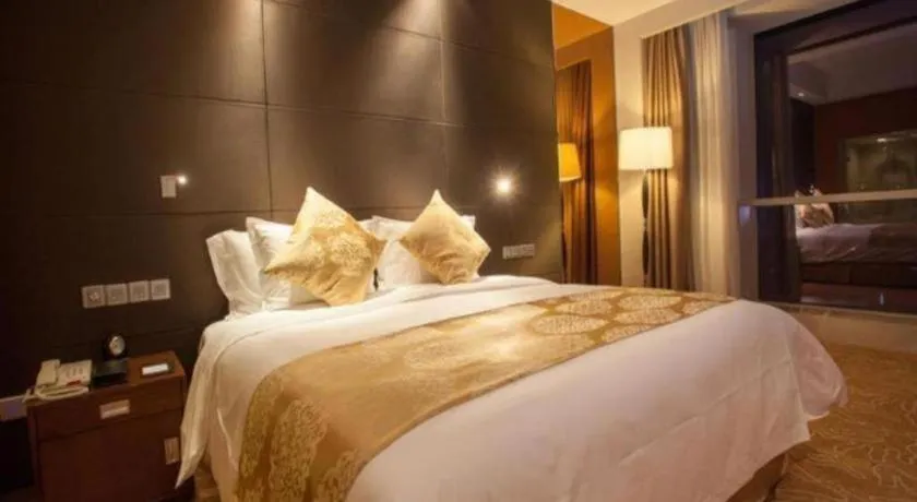 Bed in Qingdao Haidu Hotel