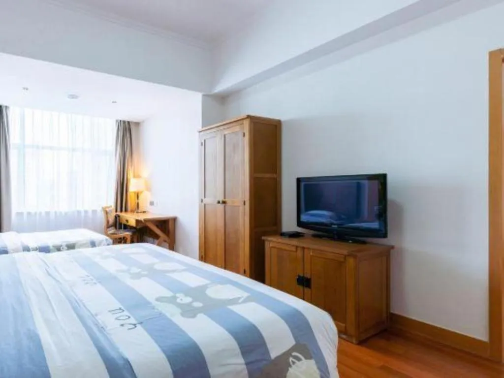 Bed in Qingdao Haidu Hotel