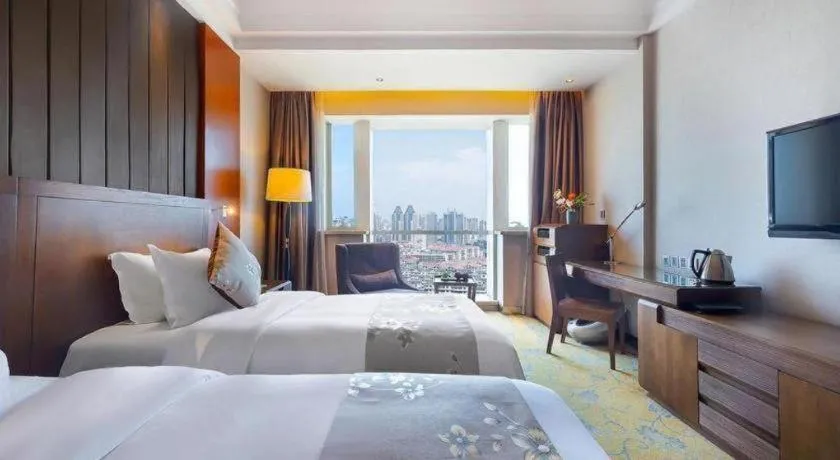 Bed in Qingdao Haidu Hotel