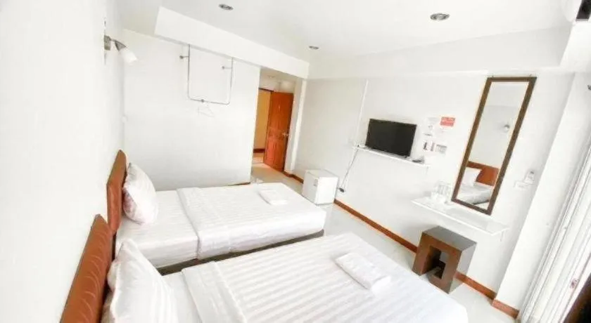 Bed in Baan Rim Khong Hotel