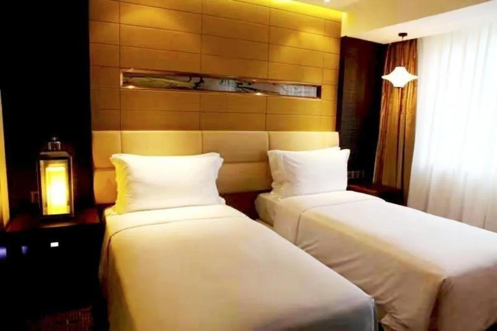 Bed in Grand Metropark Hotel Qingdao