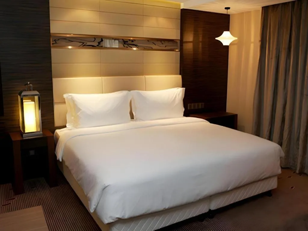 Bed in Grand Metropark Hotel Qingdao