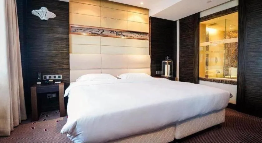 Bed in Grand Metropark Hotel Qingdao