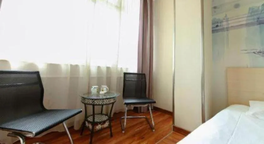 Bed in Super 8 Hotel Jinan Railway Station Square