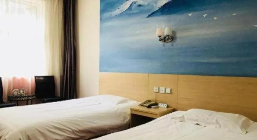 Bed in Super 8 Hotel Jinan Railway Station Square