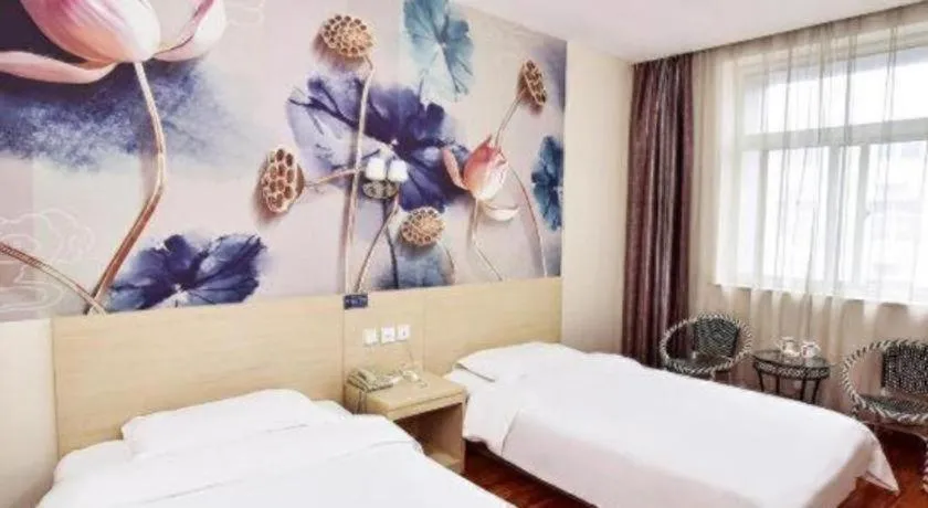 Bed in Super 8 Hotel Jinan Railway Station Square