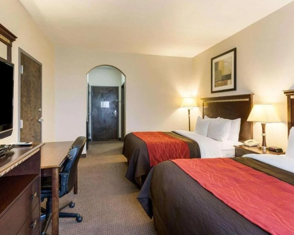 Bed in Comfort Inn & Suites Winnie